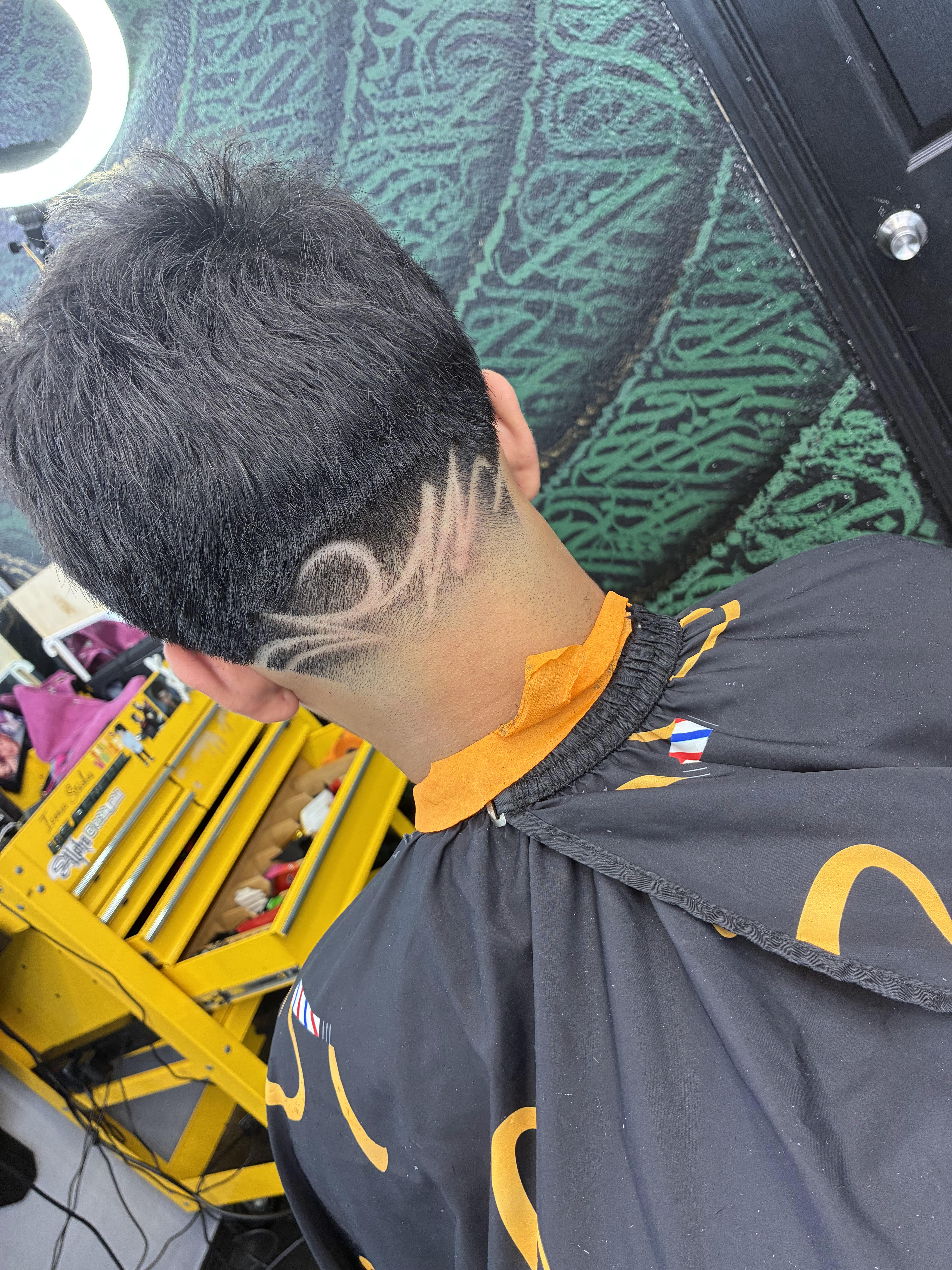 Child receiving a haircut